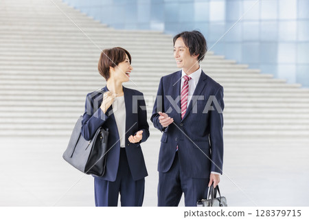 A business team of men and women in suits 128379715