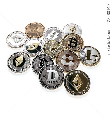 A collection of coins with different designs, including one with the letter L 128380140