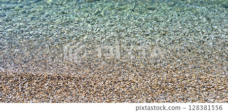 Pebble sea shore 128381556