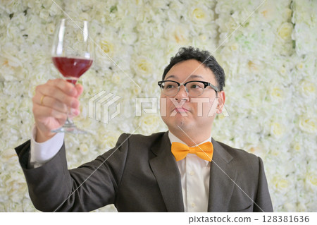 Man holding wine Man holding wine 128381636