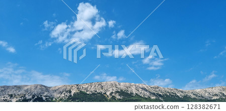 Mountains above the western side of Baska Bay 128382671