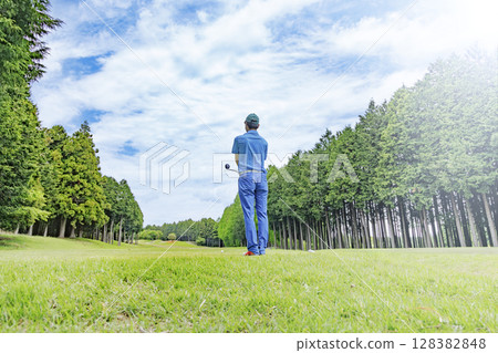 A pleasant golf course with beautiful greenery A pleasant golf course with beautiful greenery 128382848