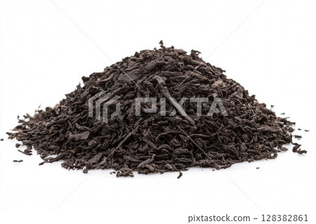 Dry black tea leaves isolated on white background. Pile of Dried fermented tea. Black Tea Leaves Heap. Close Up, Macro. Front View. Texture. Copy Space. Dried Tea. Abstract Food and Drink Backdrop. Dry black tea leaves isolated on white background. Pile of Dried fermented tea. Black Tea Leaves Heap. Close Up, Macro. Front View. Texture. Copy Space. Dried Tea. Abstract Food and Drink Backdrop. 128382861