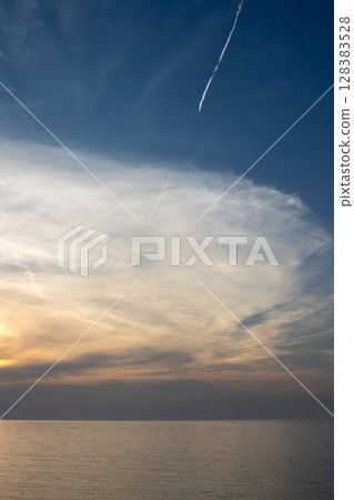 Cloudy summer sunset, Acharavi, Corfu, Greece 128383528