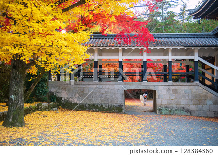 Japanese lady with kimono and umbrella at Nanzenji temple in fall, Kyoto Japanese lady with kimono and umbrella at Nanzenji temple in fall, Kyoto 128384360
