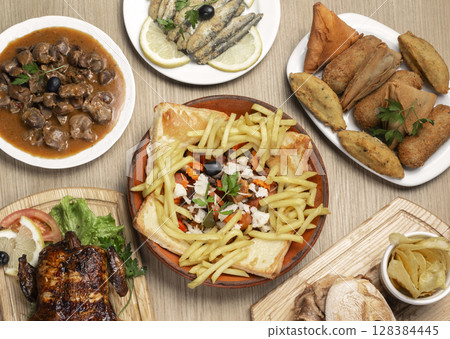 many different traditional portuguese food dishes meal set on table many different traditional portuguese food dishes meal set on table 128384445