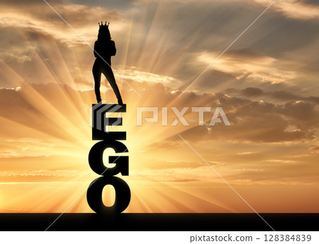 Silhouette of a narcissistic and selfish woman with a crown on her head standing on the word ego 128384839