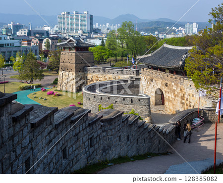Summer at Suwon Old city wall at Hwaseong Fortress, Traditional Architecture of Korea at Suwon, South Korea. Summer at Suwon Old city wall at Hwaseong Fortress, Traditional Architecture of Korea at Suwon, South Korea. 128385082