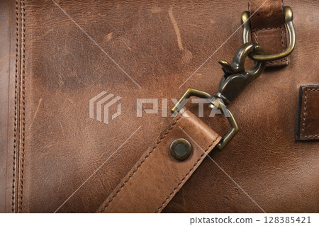 Brown leather bag detail Brown leather bag detail 128385421