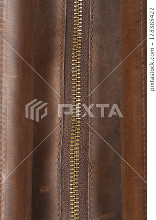 Brown leather bag detail 128385422