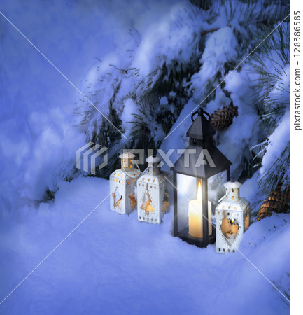 Lanterns in the snow under the Christmas tree Lanterns in the snow under the Christmas tree 128386585