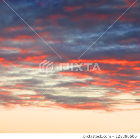Bright clouds in the evening sky Bright clouds in the evening sky 128386600
