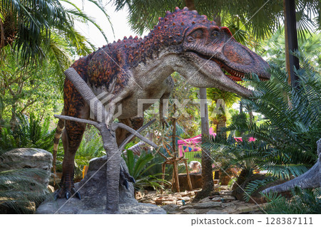 Pattaya,Thailand-January 28,2022:The dinosaurs statue is beautiful for travel in holiday at Nong Nooch Tropical Botanical Garden 128387111
