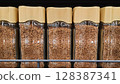 Glass jars of instant coffee filling a supermarket shelf 128387341