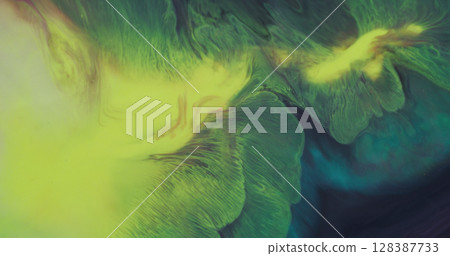 Ink splatter. Drip texture. Defocused yellow blue color water splash chemical flow stains spreading on abstract creative background. Ink splatter. Drip texture. Defocused yellow blue color water splash chemical flow stains spreading on abstract creative background. 128387733