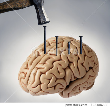 Human brain with nails hammered into it. Mental torture concept. Human brain with nails hammered into it. Mental torture concept. 128388702