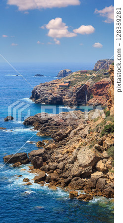 Summer Atlantic coast (Algarve, Portugal). 128389281