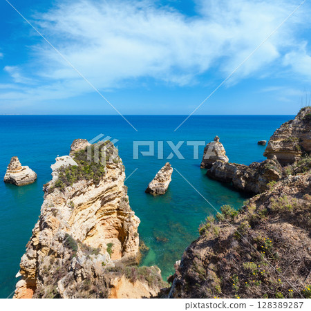 Atlantic rocky coastline (Algarve, Portugal). 128389287