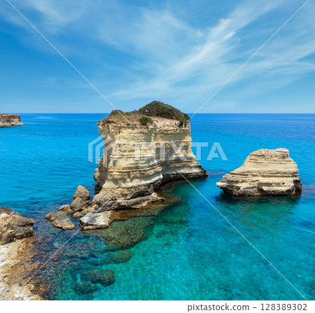 Faraglioni at Torre Sant Andrea, Italy 128389302
