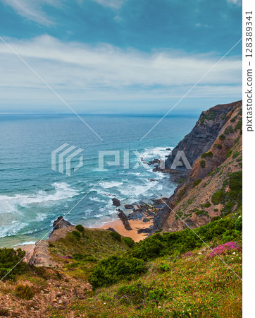 Summer Atlantic rocky coast (Algarve, Portugal). 128389341