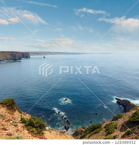 Summer Atlantic ocean rocky coastline (Algarve, Portugal). 128389352