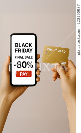 Woman hand using tablet with black Friday sale on screen device background for mock up, template, technology and lifestyle concept 128390987