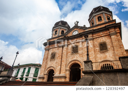 Our Lady of the Immaculate Conception Church and the beautiful colonial town of Concepcion in Antioquia, Colombia. 128392497
