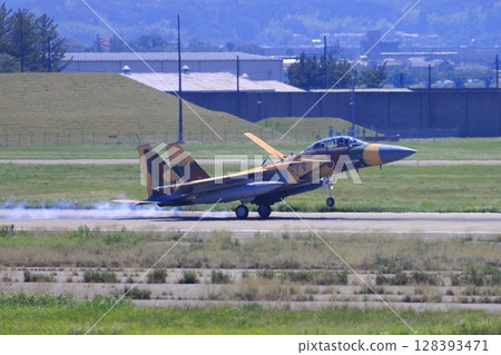 An Air Self-Defense Force F-15 fighter (aggressor) returning to Komatsu Air Base after completing a training flight. An Air Self-Defense Force F-15 fighter (aggressor) returning to Komatsu Air Base after completing a training flight. 128393471