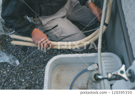 Air conditioner installation 128395350