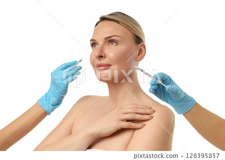 Woman undergoing skin enhancement with injections, isolated on white, PNG Woman undergoing skin enhancement with injections, isolated on white, PNG 128395857
