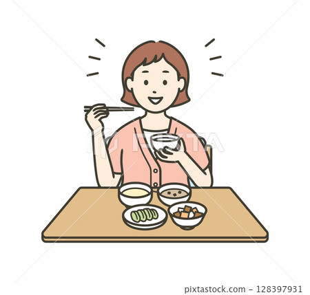 圖：一位身穿短袖衣服、面帶微笑、正在吃健康食品的年輕女子 128397931