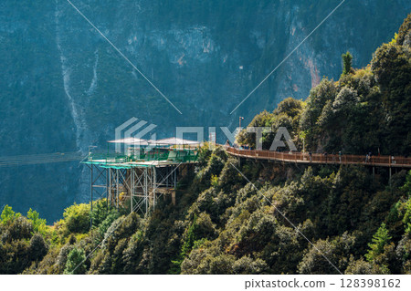Zip lines stretching across Balagezong mountains in Shangri-la, China 128398162