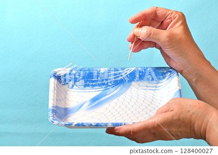 食物托盤：用牙籤檢查它們是否可回收 128400027