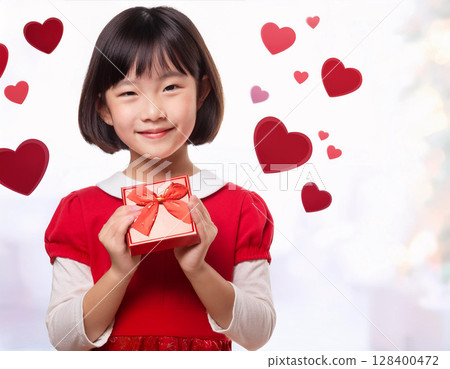 Girl giving a present on Valentine's Day 128400472