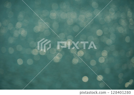 Background material of the water surface rippling and sparkling in the wind. Variations in the strength of the blur 128401280