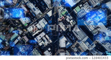 Aerial view of modern city taken by drone and concept of digital technology Horizontal visual for banners and advertisements 128401433