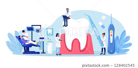 Dentist appointment, stomatology. Dental checkup, teeth care procedures. Teeth whitening and professional cleaning. Cosmetic dentistry. Dentist doctor in uniform treating tooth using medical equipment 128402545