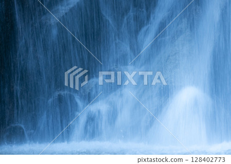 Beautiful waterfall scenery with flowing water 128402773
