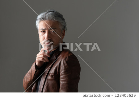 A man in a jacket A man in a jacket 128403629