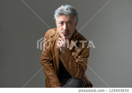 A man in a jacket 128403650