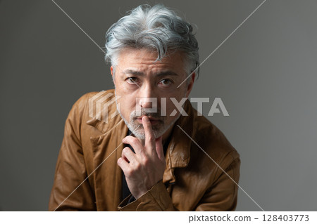 A man in a jacket 128403773