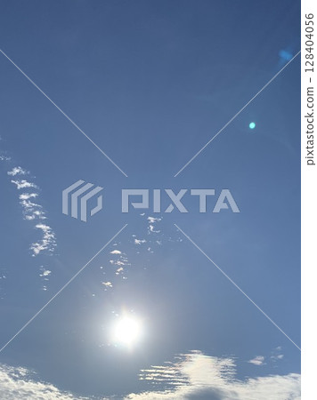 Summer sky July Morning sun and sparkling cumulus clouds #001 128404056