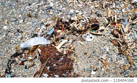 Dirty trash on the beach Dirty trash on the beach 128404160