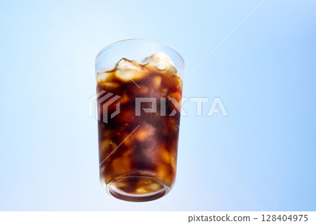 Ice coffee in a glass with ice Ice coffee in a glass with ice 128404975
