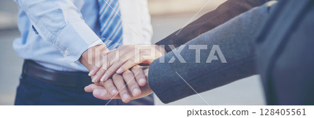 Banner diversity solidarity team multiethnic Partners hands together teamwork. Group of multiracial meetings joins hands together. Panorama Diversity people hands join empower trust team solidarity 128405561