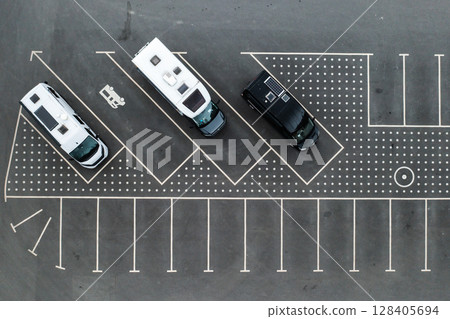 Top view of motorhomes parked in the parking lot.  128405694