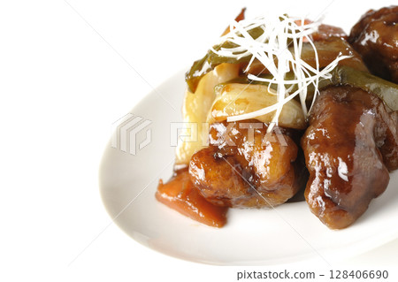 Sweet and sour pork with black vinegar photographed on white background Sweet and sour pork with black vinegar photographed on white background 128406690