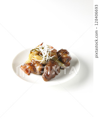Sweet and sour pork with black vinegar photographed on white background Sweet and sour pork with black vinegar photographed on white background 128406693