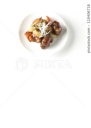 Sweet and sour pork with black vinegar photographed on white background Sweet and sour pork with black vinegar photographed on white background 128406716