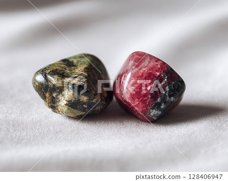 兩塊石頭放在布上的 AI 圖像 兩塊石頭放在布上的 AI 圖像 128406947